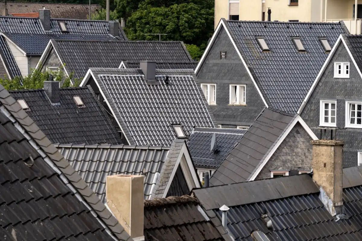 Steep roof eaves and gutter lines on houses in Lafayette, LA