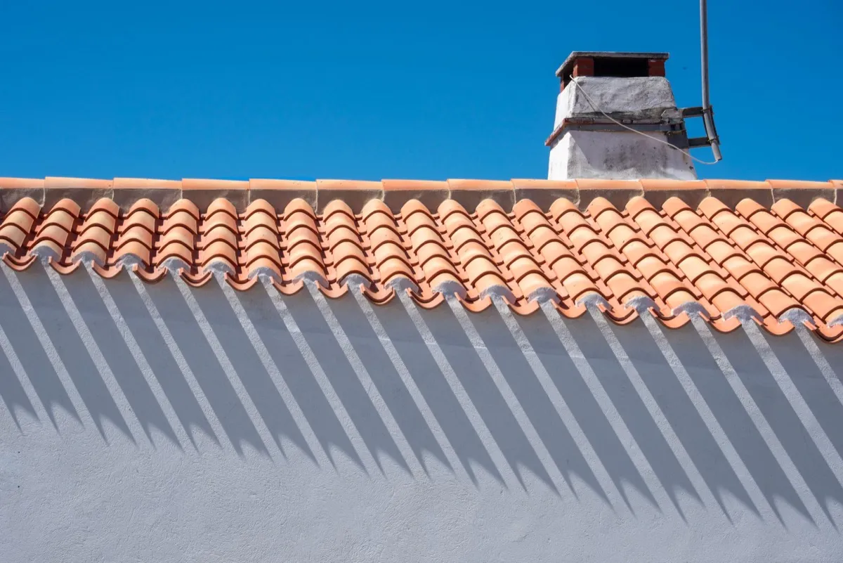 Roof ridge line and chimney on a home in Lafayette, LA