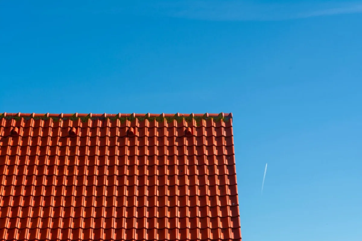 Tile roof gable in full sun, the kind of exposure that sets roof life in Lafayette, LA